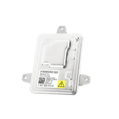 Headlight Ballast for Bmw silver metal xenon control module with mounting tabs and warning label
