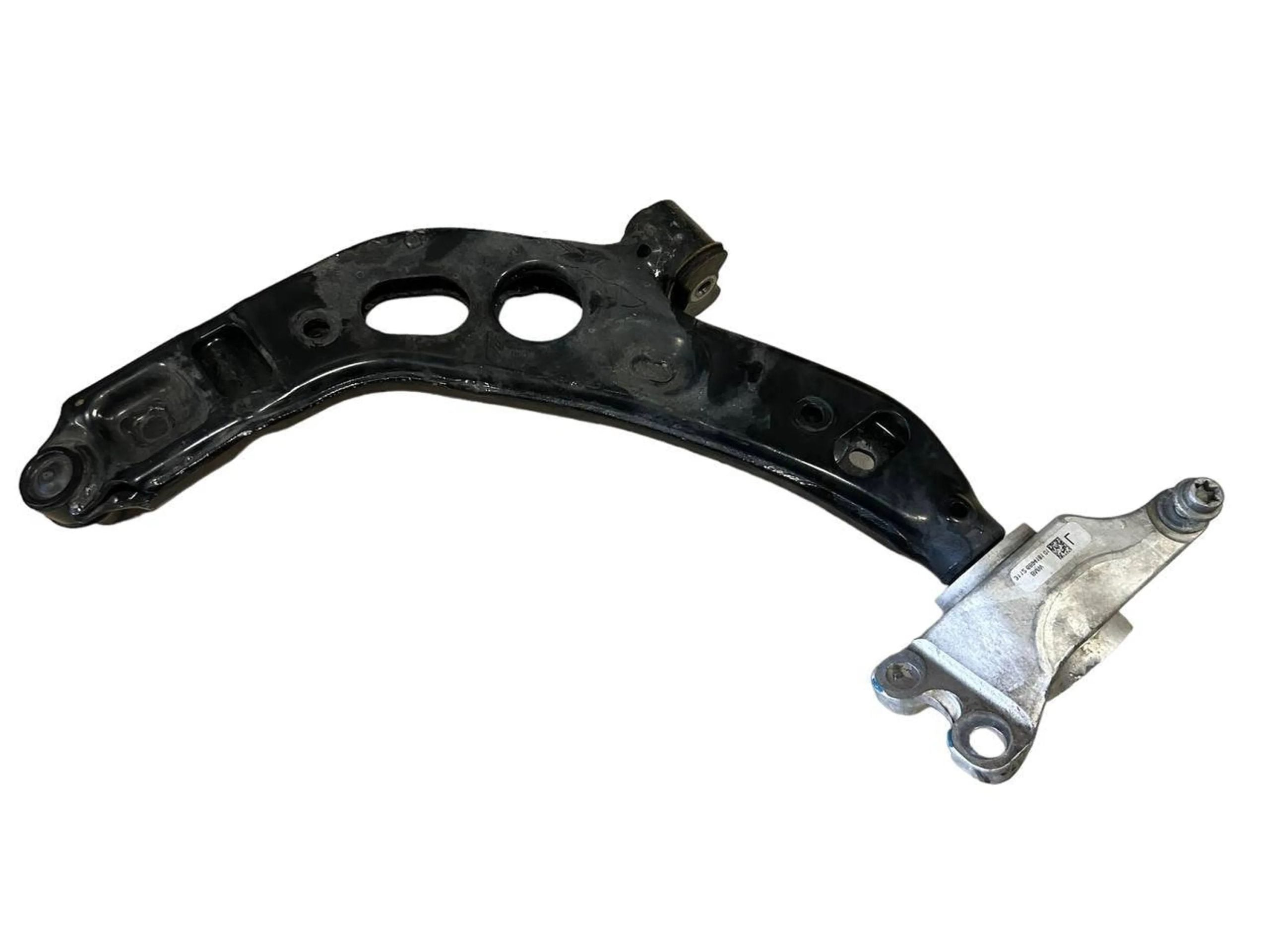 Black metal mechanical component on a white background