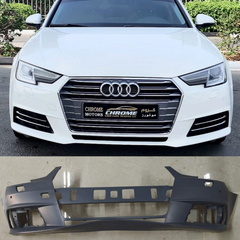 Audi A4 8W bumper set with model details on a blurred background